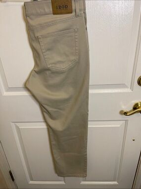 IZOD. Light Khaki Jeans with Leather Logo Patch
